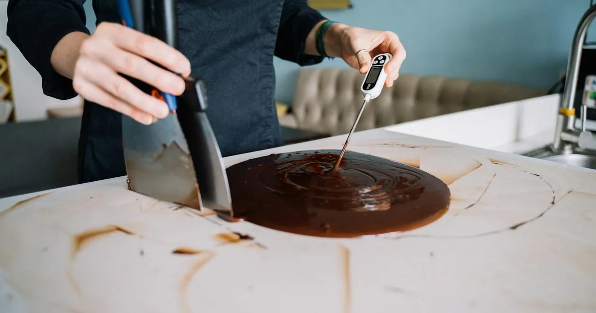 Bluetooth food thermometer probe being used to check internal food temperature
