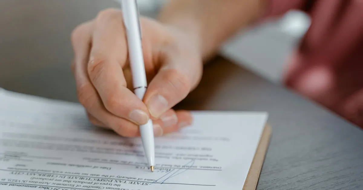 Restaurant owner reviewing health inspection report documentation