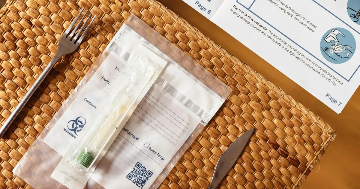 Health inspector examining restaurant kitchen for violations